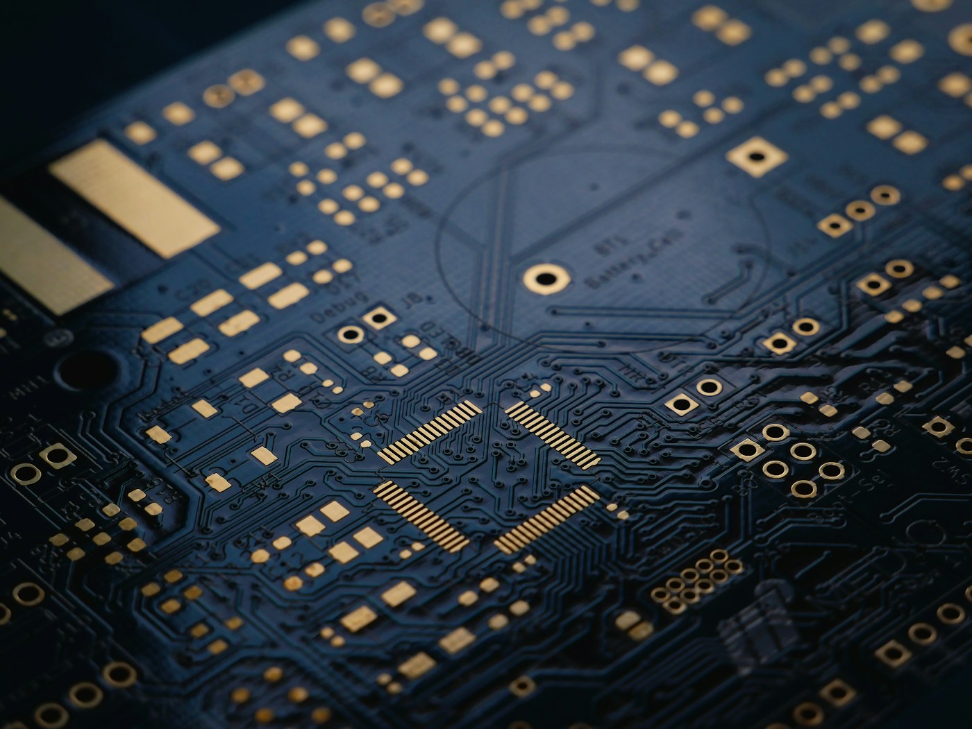 Close-up of a printed circuit board under assembly
