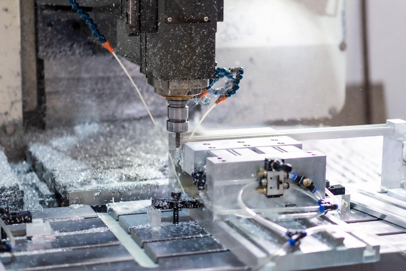 CNC machining tool cutting a metal part